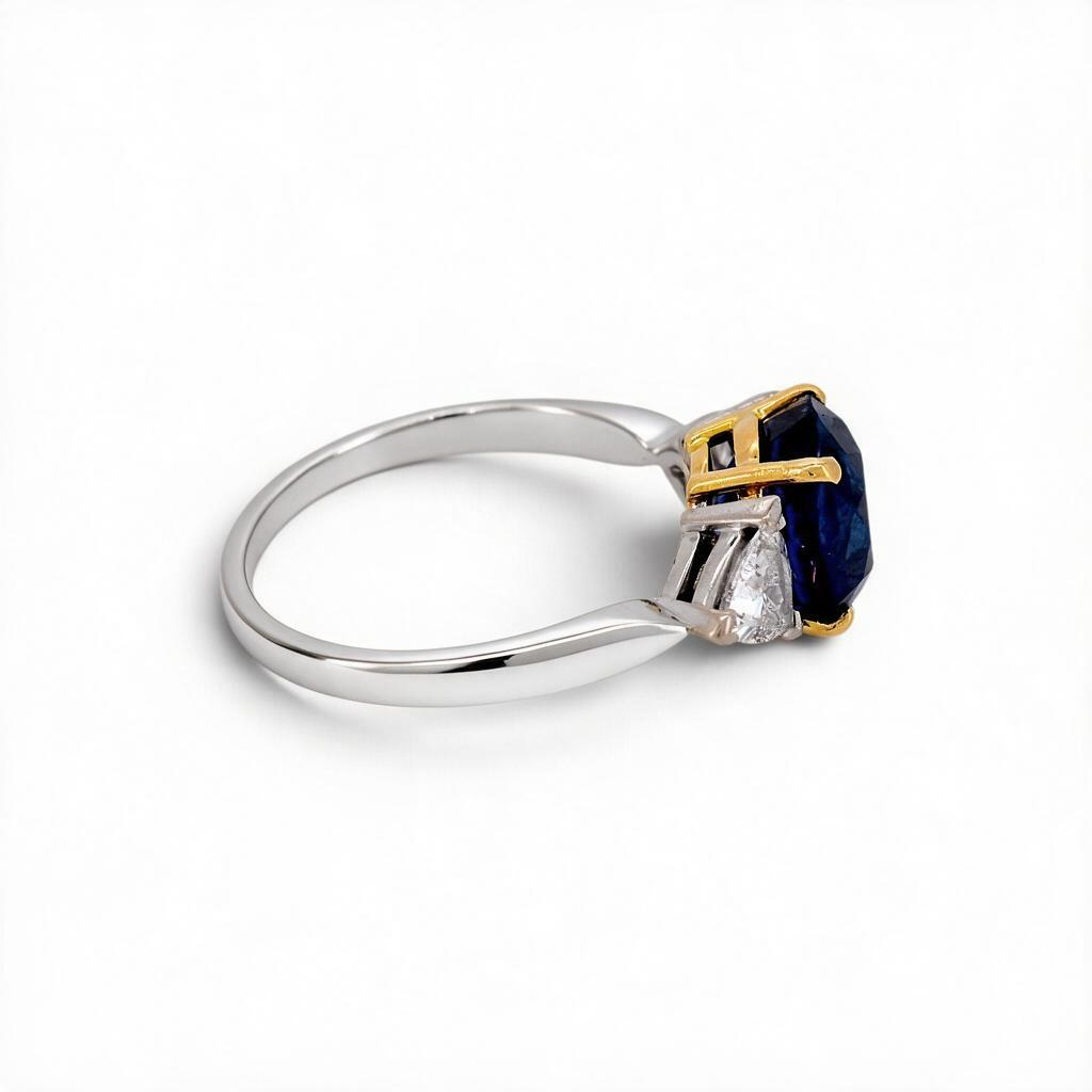 Vintage 18k Gold Trilogy Ring — 3.55ct Unheated Vivid Blue Madagascar Sapphire & Trillion-Cut Diamonds | Bellerophon Certified
