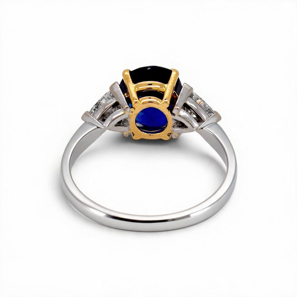 Vintage 18k Gold Trilogy Ring — 3.55ct Unheated Vivid Blue Madagascar Sapphire & Trillion-Cut Diamonds | Bellerophon Certified