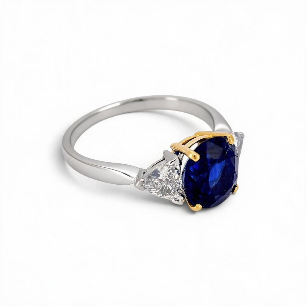 Vintage 18k Gold Trilogy Ring — 3.55ct Unheated Vivid Blue Madagascar Sapphire & Trillion-Cut Diamonds | Bellerophon Certified