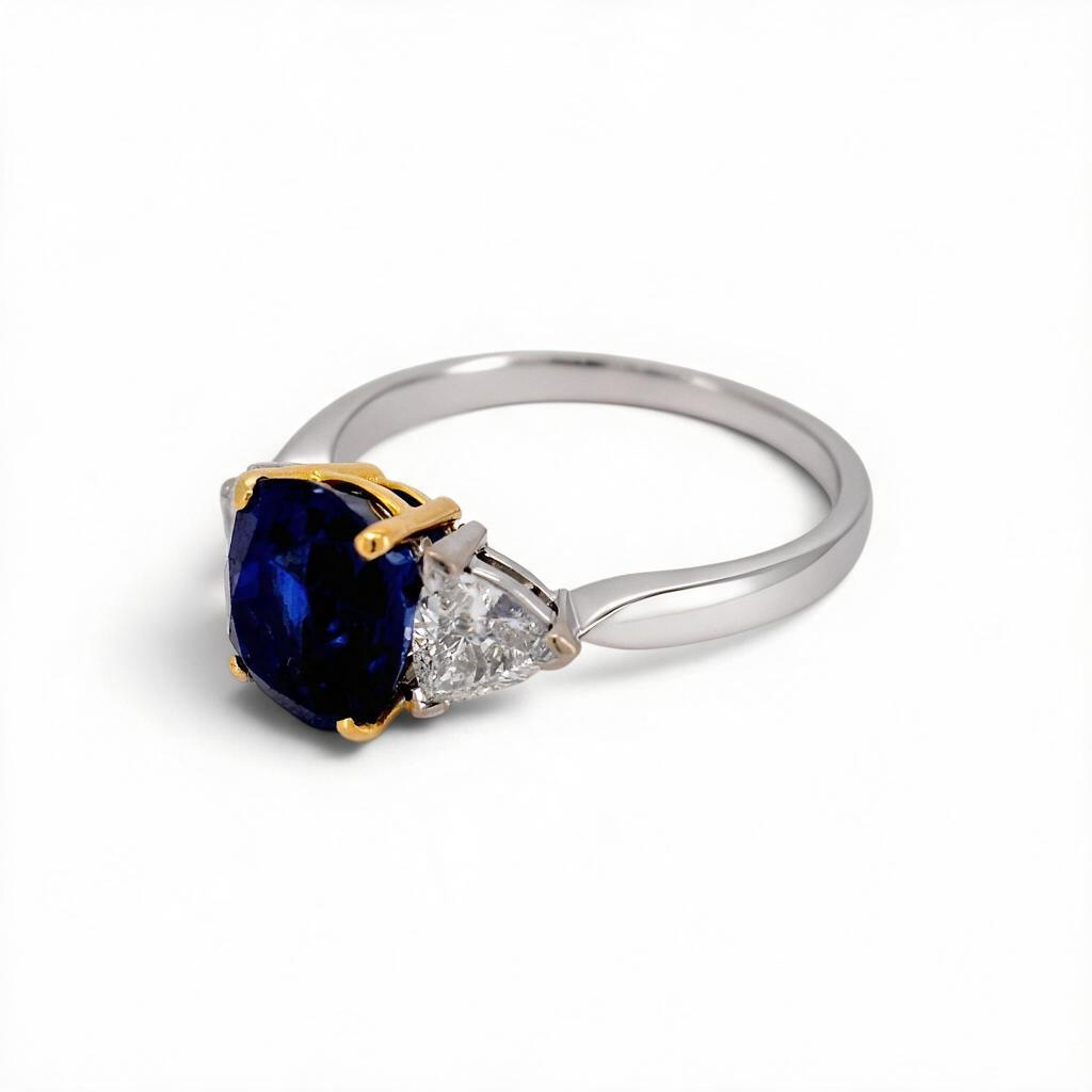 Vintage 18k Gold Trilogy Ring — 3.55ct Unheated Vivid Blue Madagascar Sapphire & Trillion-Cut Diamonds | Bellerophon Certified