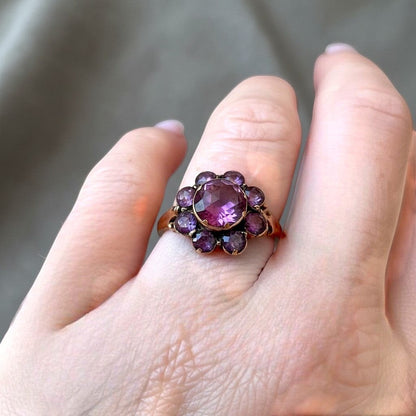 antique victorian daisy ring gold and garnets,  view on a hand