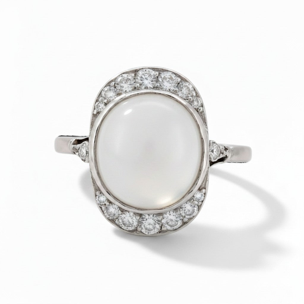 Antique Art Deco 18k gold ring natural 
moonstone cabochon 3ct diamond surround front view circa 1920 — Antique Jewelry Finds