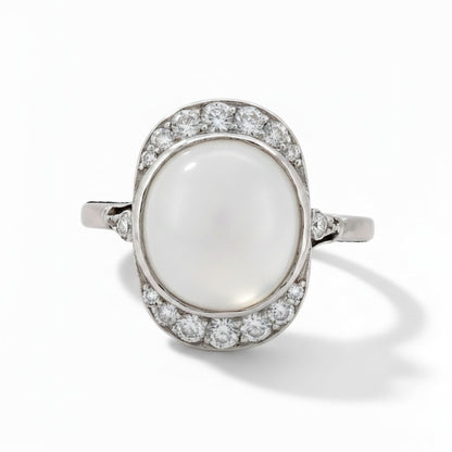 Antique Art Deco 18k gold ring natural 
moonstone cabochon 3ct diamond surround front view circa 1920 — Antique Jewelry Finds
