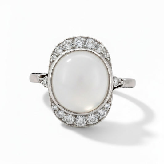 Antique Art Deco 18k gold ring natural 
moonstone cabochon 3ct diamond surround front view circa 1920 — Antique Jewelry Finds