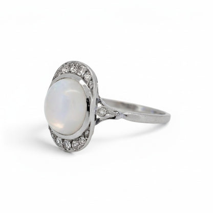 Natural moonstone cabochon approximately 3 carats adularescence Art Deco ring close-up — Antique Jewelry Finds