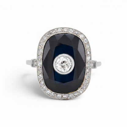 Antique Art Deco platinum cocktail ring 
natural sapphire 10-15ct old-cut diamond halo front view circa 1920 — Antique Jewelry Finds
