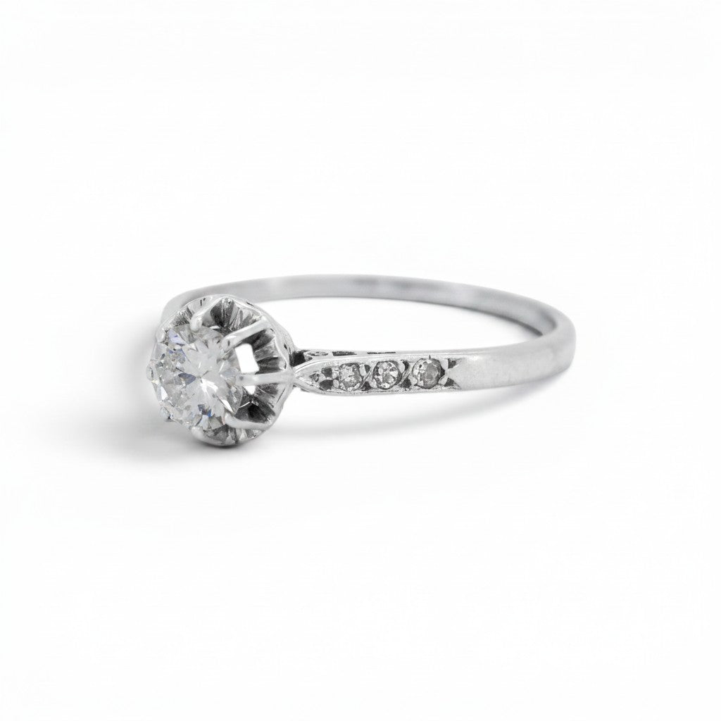 Antique Art Deco platinum solitaire ring three diamond shoulders side view dog head hallmark — Antique Jewelry Finds