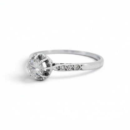 Antique Art Deco platinum solitaire ring three diamond shoulders side view dog head hallmark — Antique Jewelry Finds