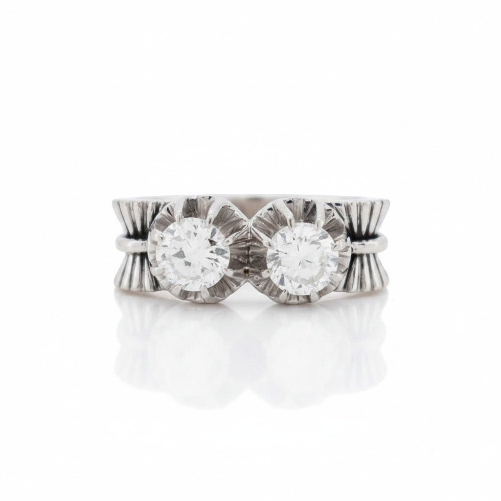 Antique 1945 French Toi et Moi ring with two old cut diamonds and platinum bow motif