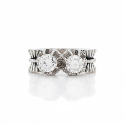 Antique 1945 French Toi et Moi ring with two old cut diamonds and platinum bow motif