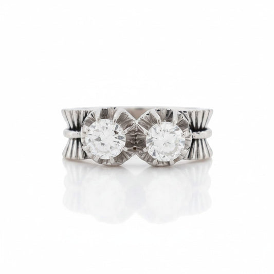 Antique 1945 French Toi et Moi ring with two old cut diamonds and platinum bow motif