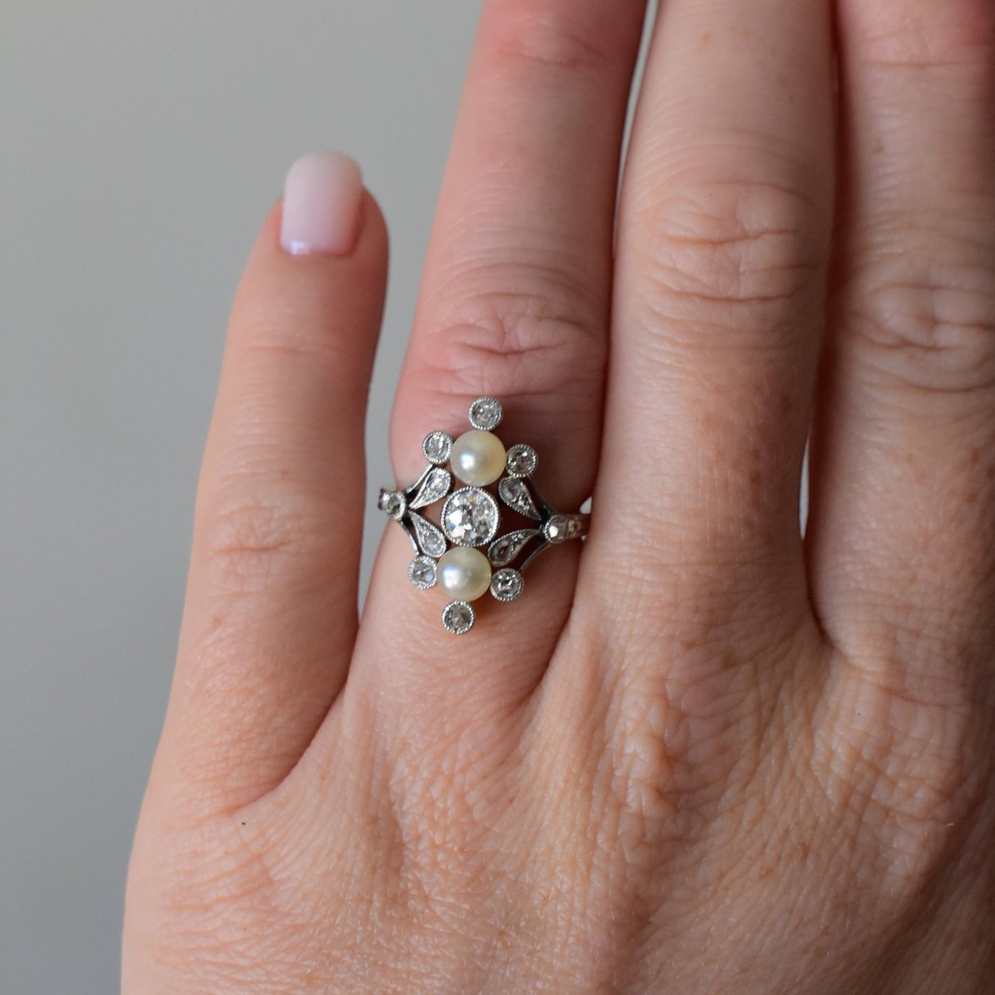 Two matched pearls 5mm old-cut diamond 0.30ct Art Nouveau ring close-up circa 1910 — Antique Jewelry Finds