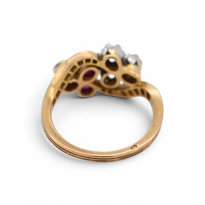 Detailed view of hallmark french eagle head on the band of the antique clover ring