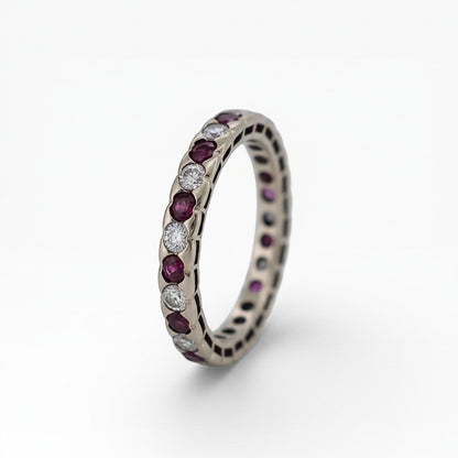 750 hallmark for solid 18k gold stamped inside the vintage eternity ring
