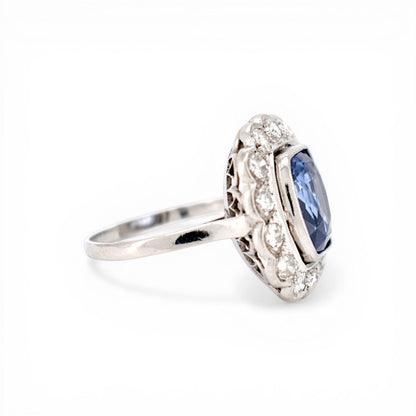 Detailed shot of 1.20ct G/H color diamond halo surrounding unheated sapphire