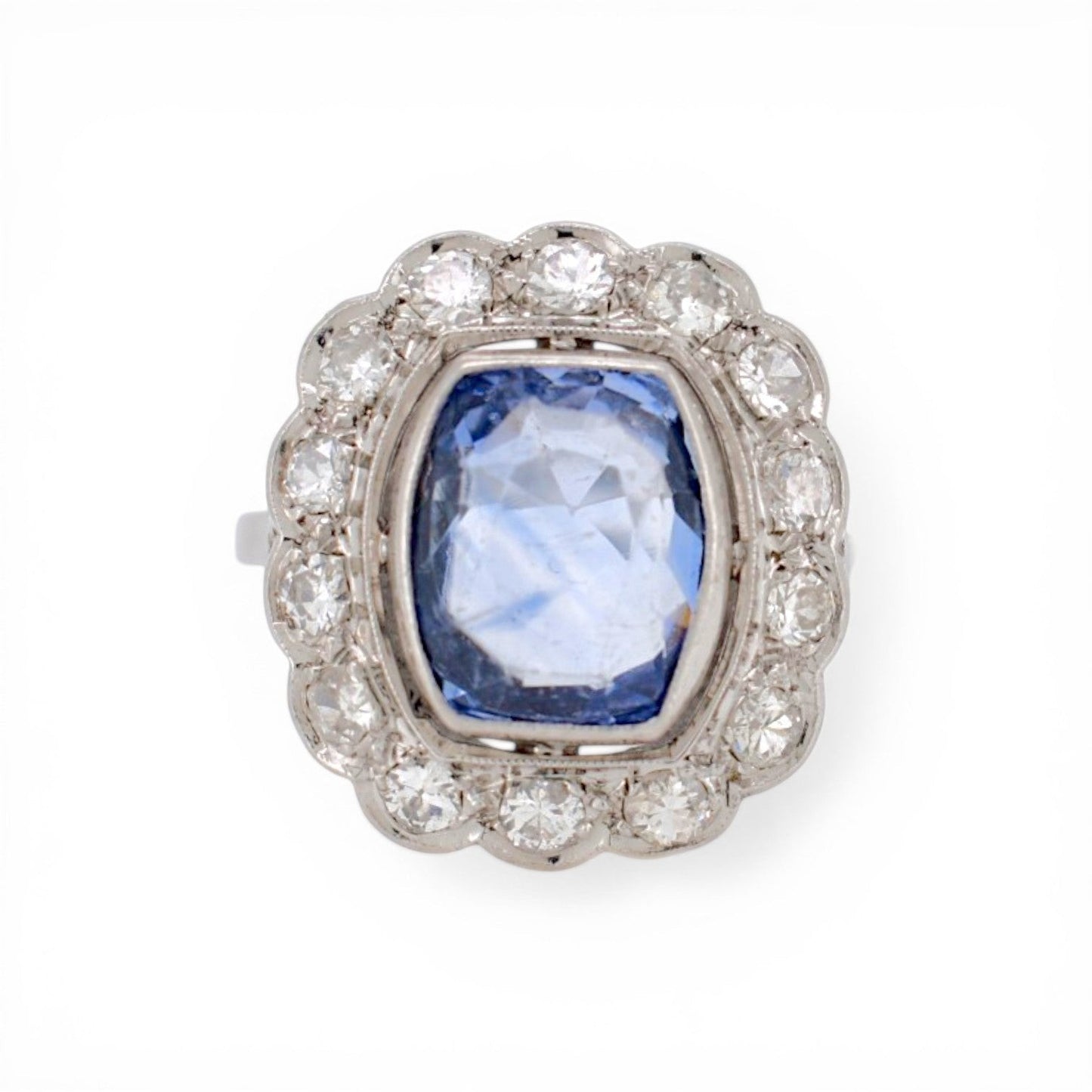Art Deco Pompadour ring in platinum featuring 4ct unheated Ceylon sapphire and diamonds