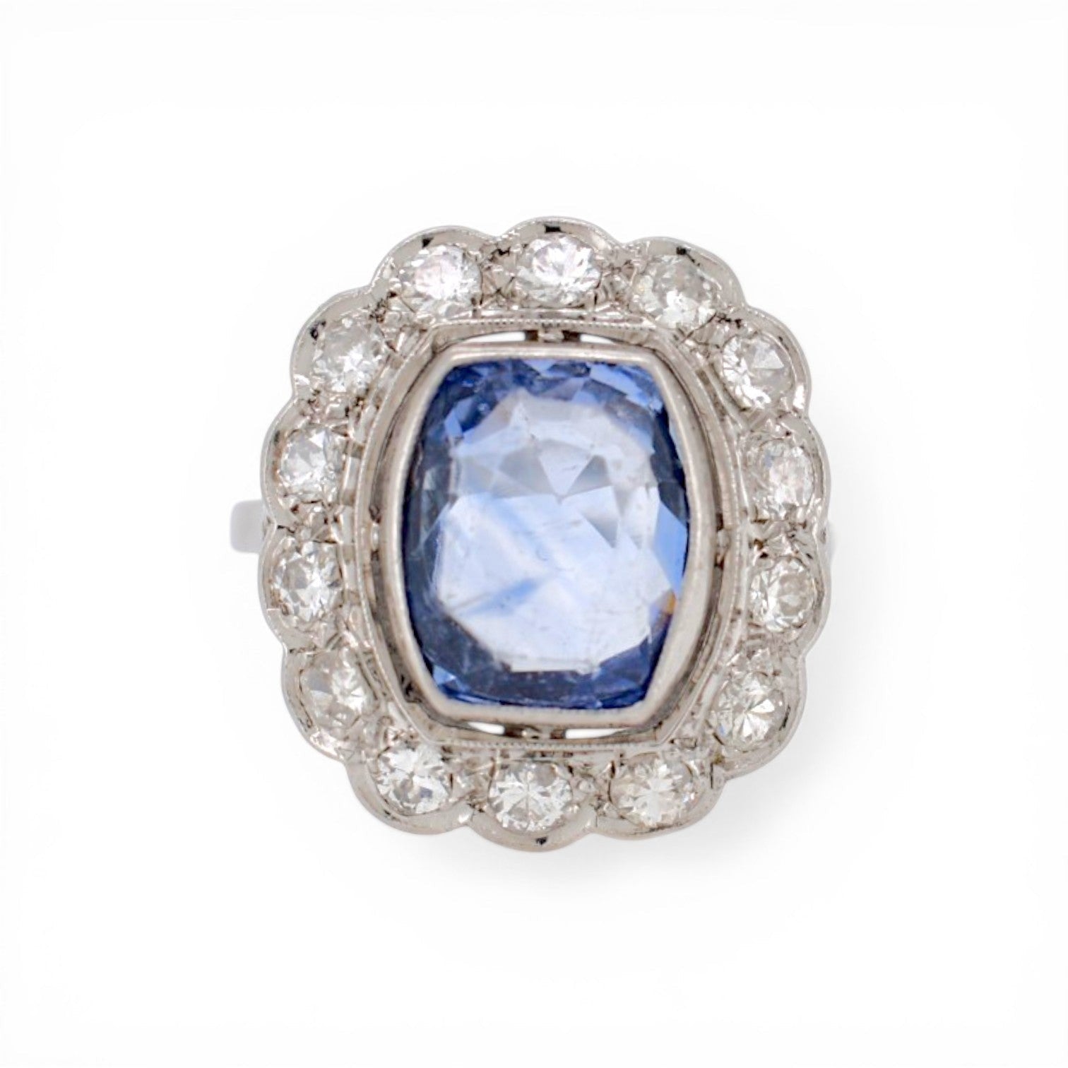 Art Deco Pompadour ring in platinum featuring 4ct unheated Ceylon sapphire and diamonds