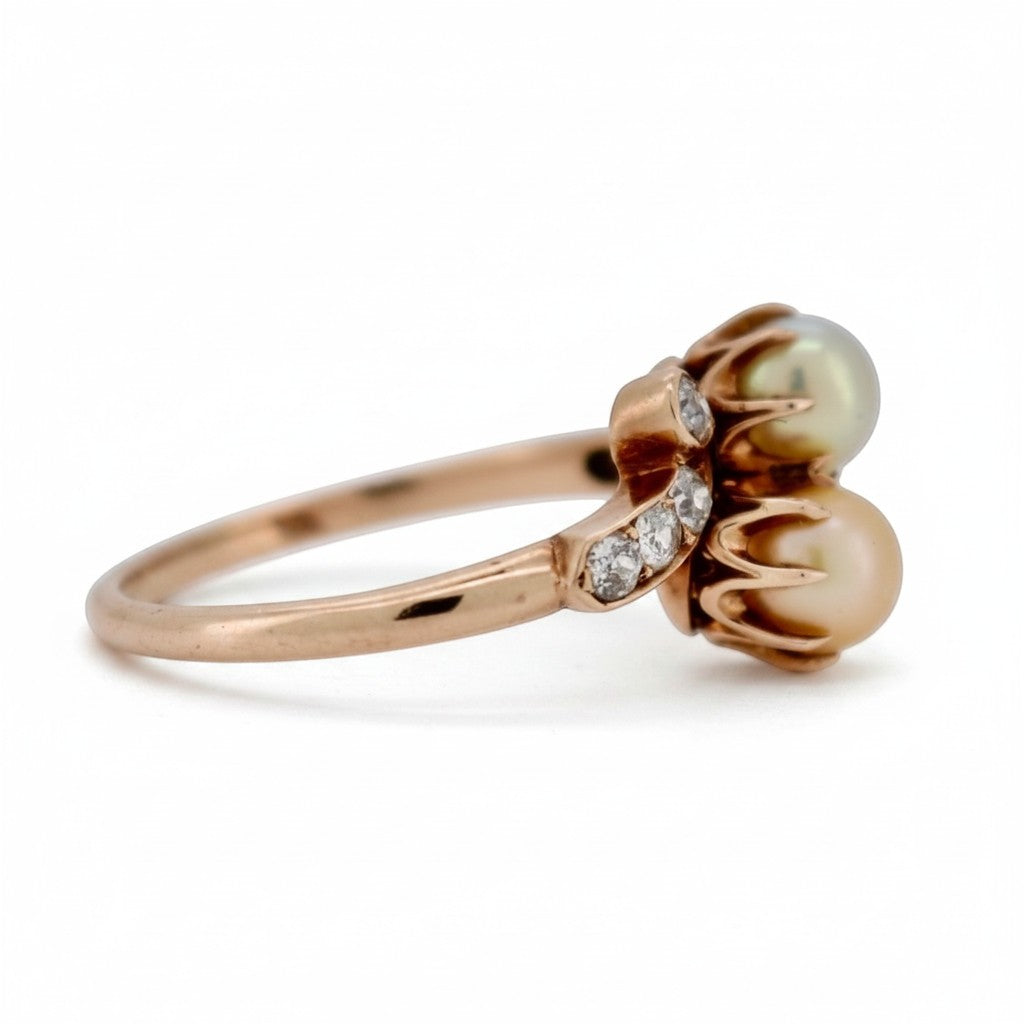 Side profile view showing the delicate 14k rose gold basket and 10mm head height
