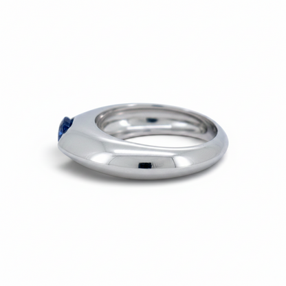 Antique Jewelry Finds Piaget Biseau 18k gold ring featuring a natural sapphire and brilliant-cut diamond.