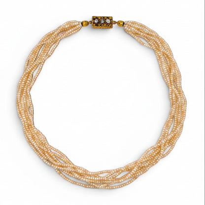 Complete overhead view of the 41 cm antique multi-strand pearl necklace showing the perfect symmetry of the six rows.
