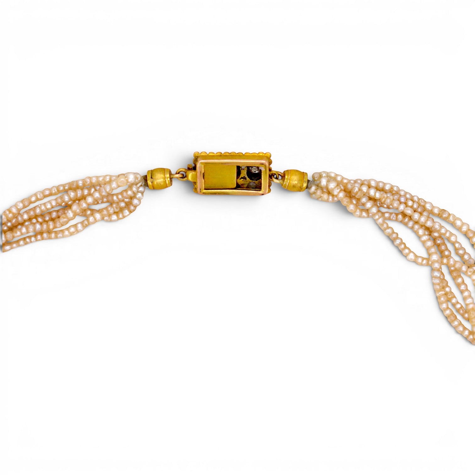 Side profile of the functional integrated cliquet clasp showing the secure push-button mechanism and French eagle head hallmark.