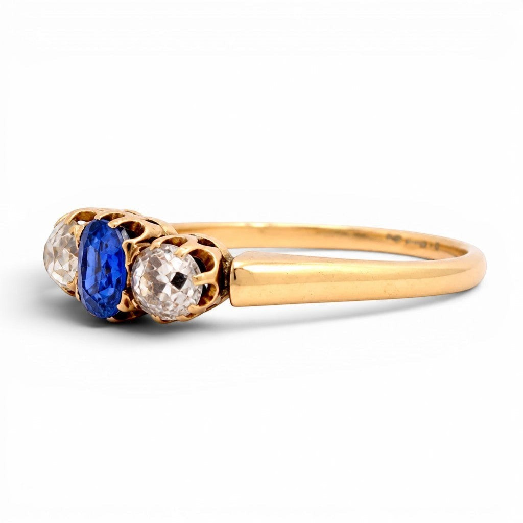 Natural oval sapphire 0.30ct old-cut diamonds Victorian trilogy ring close-up circa 1890 — Antique Jewelry Finds