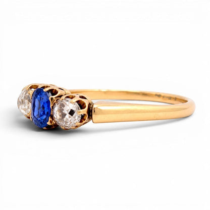 Natural oval sapphire 0.30ct old-cut diamonds Victorian trilogy ring close-up circa 1890 — Antique Jewelry Finds