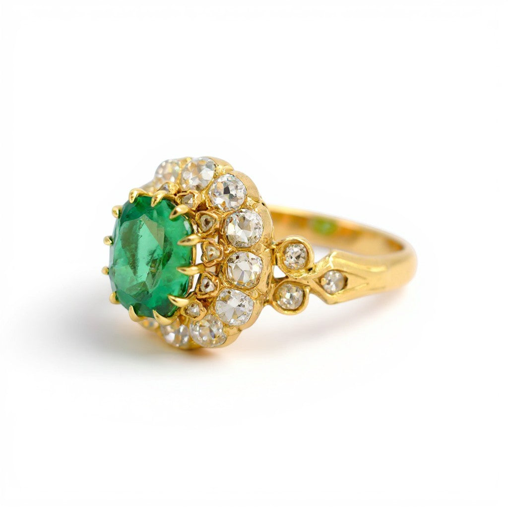 Extreme close-up focusing on the vivid green saturation and velvety depth of the 1.58-carat natural Zambian emerald.