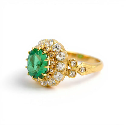 Extreme close-up focusing on the vivid green saturation and velvety depth of the 1.58-carat natural Zambian emerald.