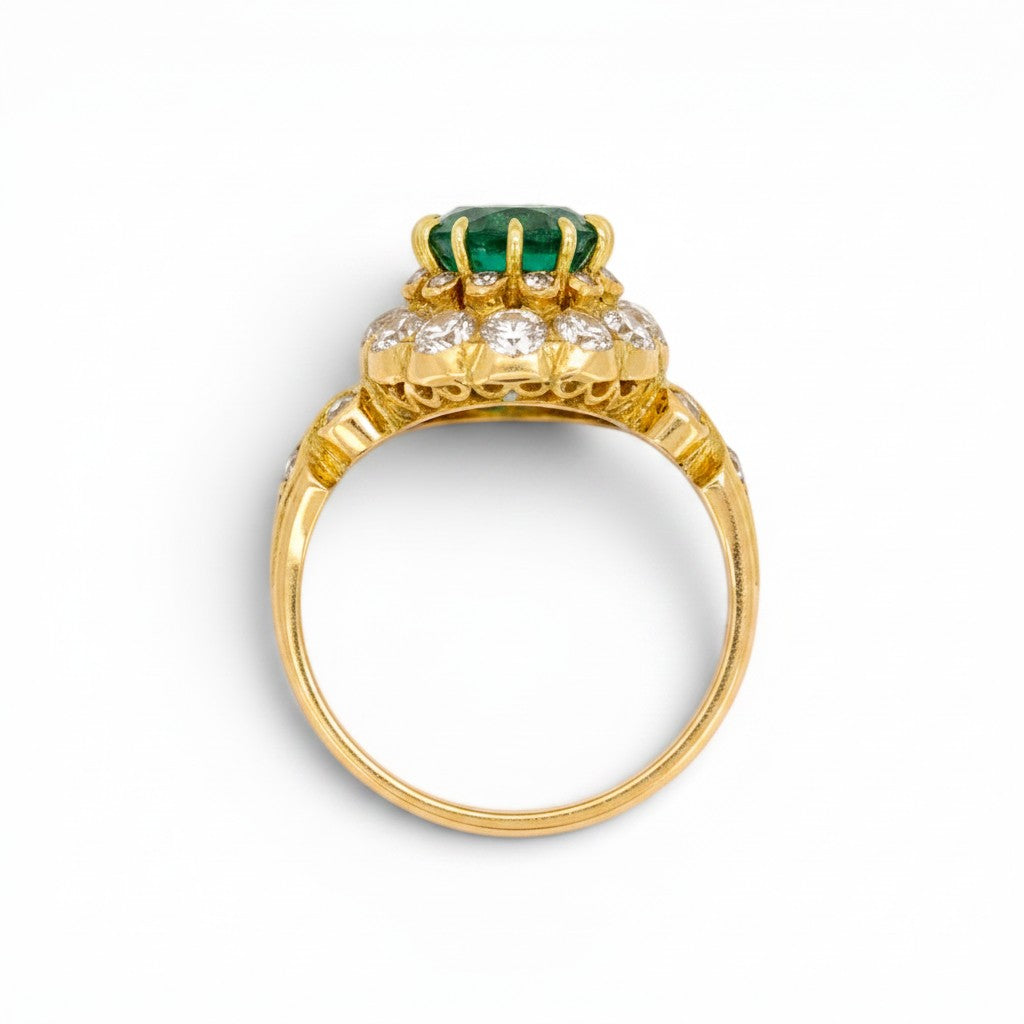 Profile of the 1880 Belle Epoque zambian cushion cut emerald statement ring showing the elevation of the double halo gallery and polished band.