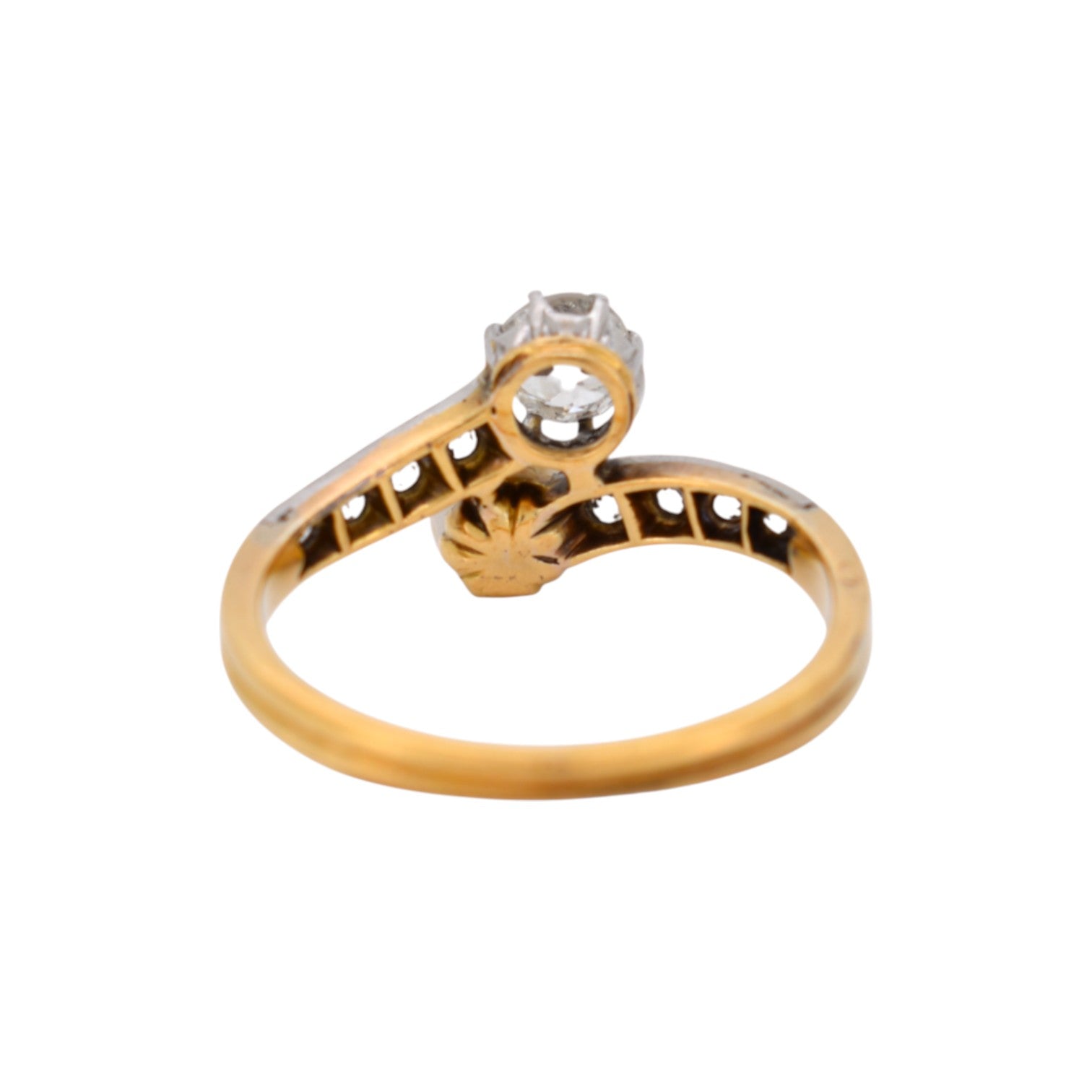 Close-up of the platinum setting and old cut diamonds on the ring shoulders