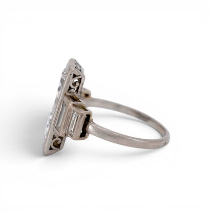 Side profile of the 15mm vertical Toi et Moi diamond ring showing the solid platinum setting structure and gallery.