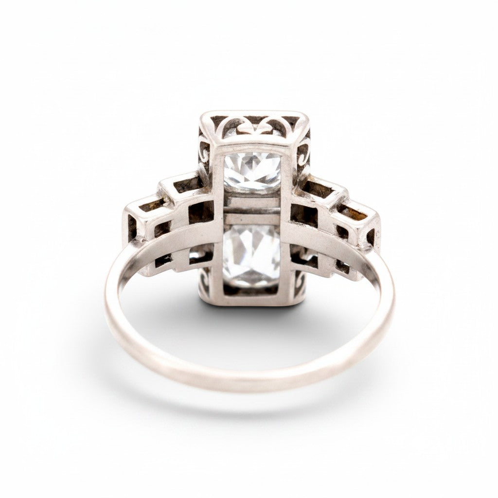 Clear macro shot of the outer/inner band showcasing the official French Mascaron platinum guarantee hallmark.