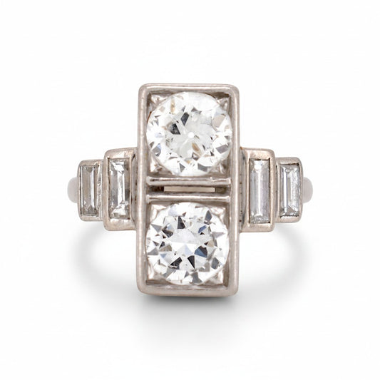 Antique 1920 Art Deco platinum Toi et Moi ring featuring two vertical 1ct old-cut diamonds by Antique Jewelry Finds.