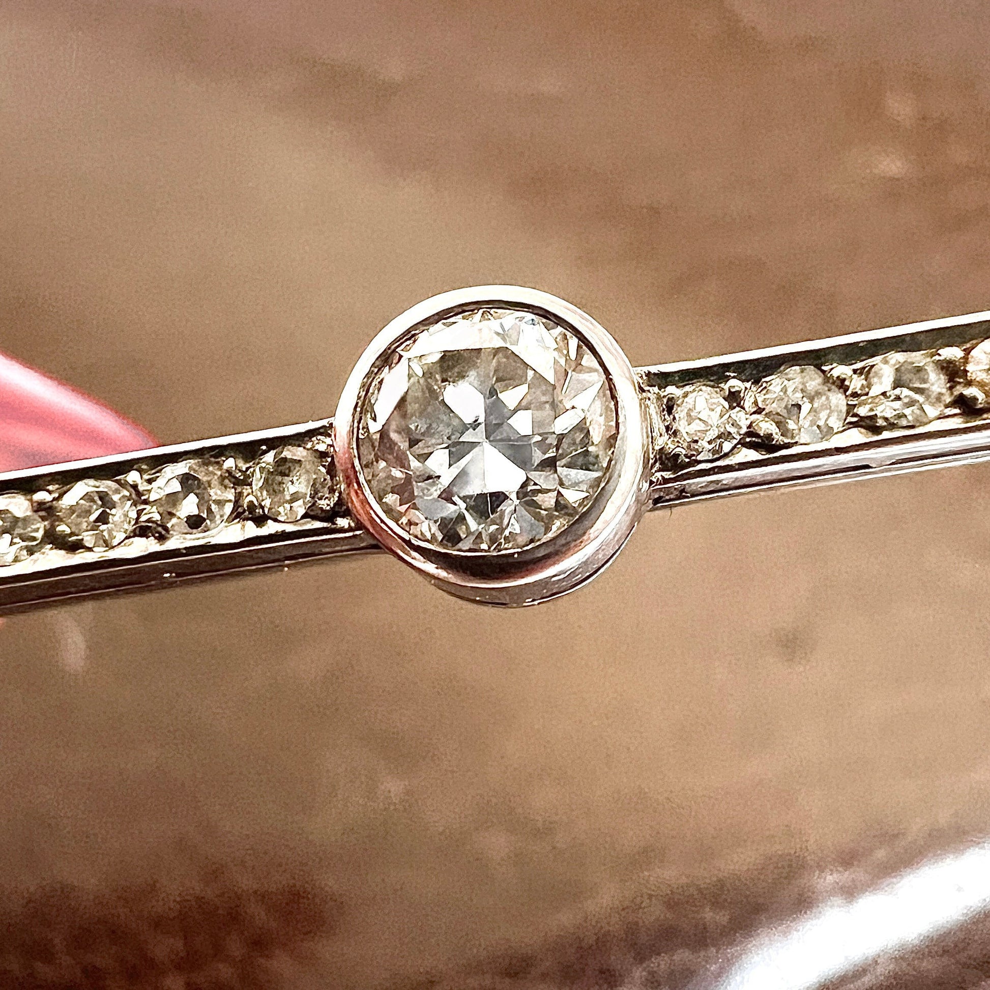 Macro shot of 0.30ct Old European cut diamond F-G VS in bezel setting