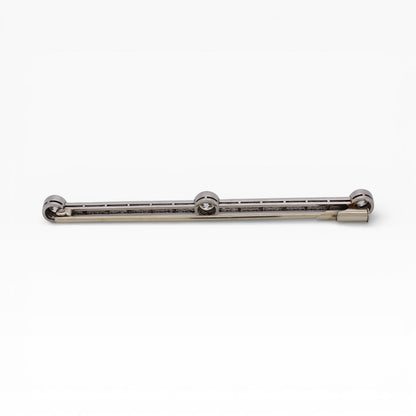 Secure antique safety clasp on the back of a platinum and gold bar brooch