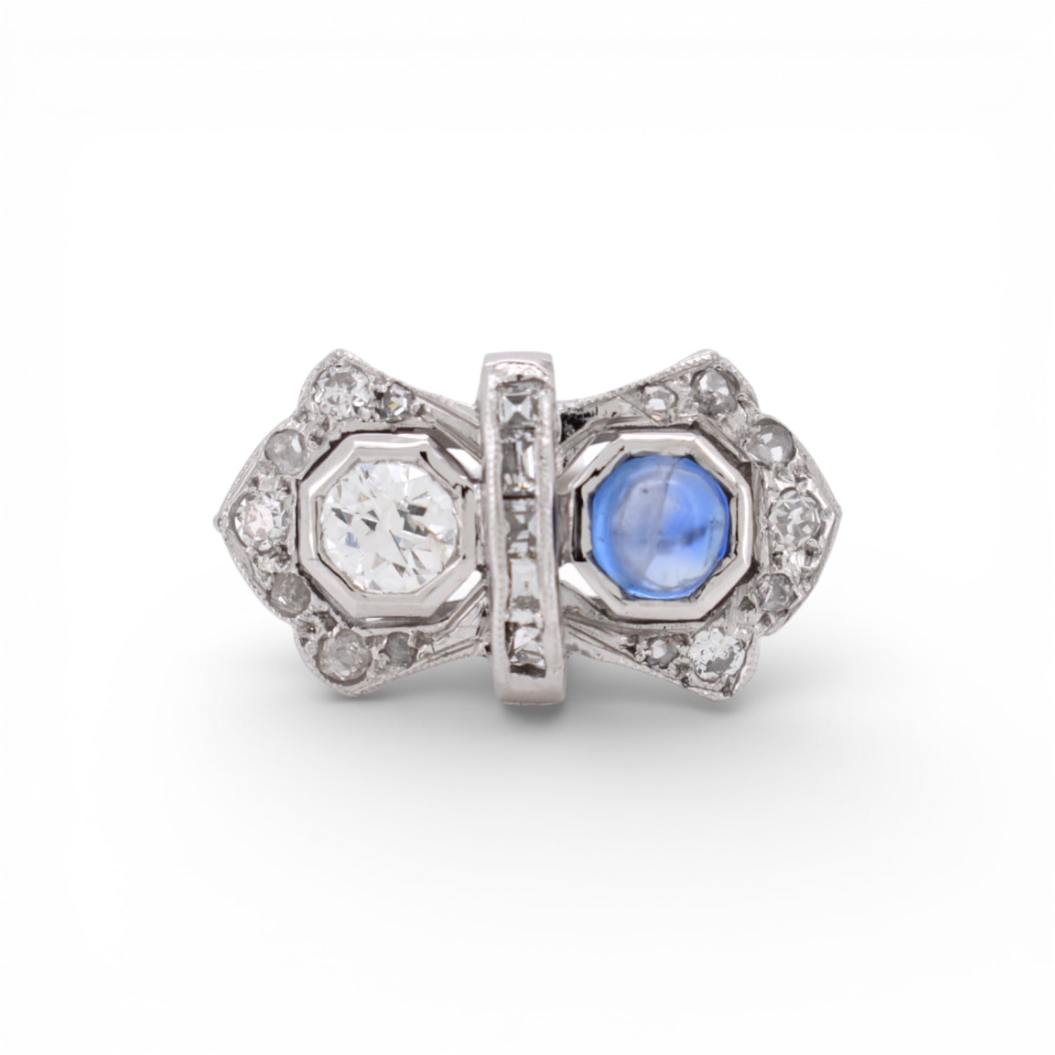 Authentic 1920s French Art Deco Toi et Moi ring featuring a blue sapphire and diamonds in 18K white gold.