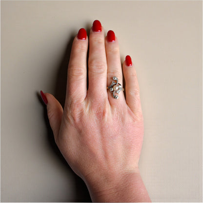 Art Nouveau statement ring attributed to Andre Rambour worn on a hand for scale