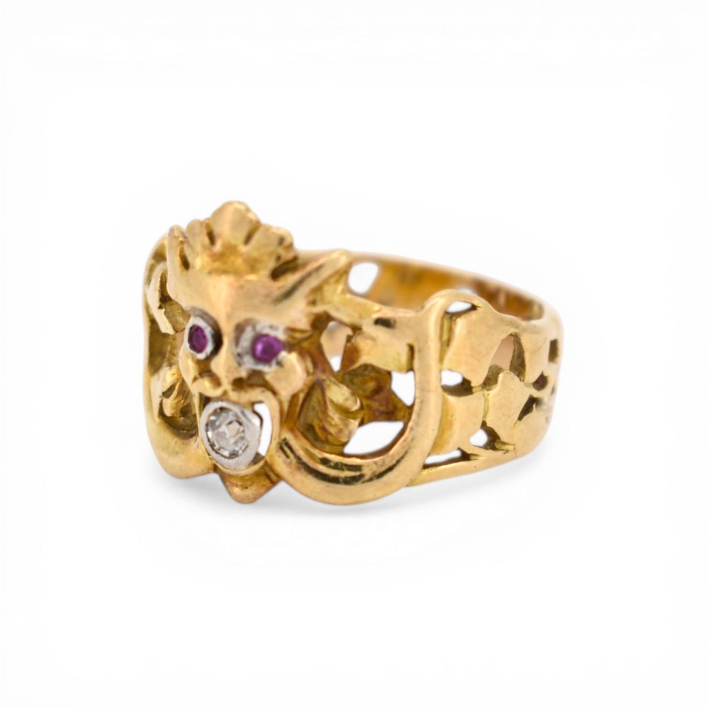 Close-up of diamond set in gargoyle's mouth Art Nouveau gold ring