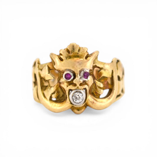 Antique Art Nouveau 18k gold gargoyle ring with ruby eyes and diamond mouth