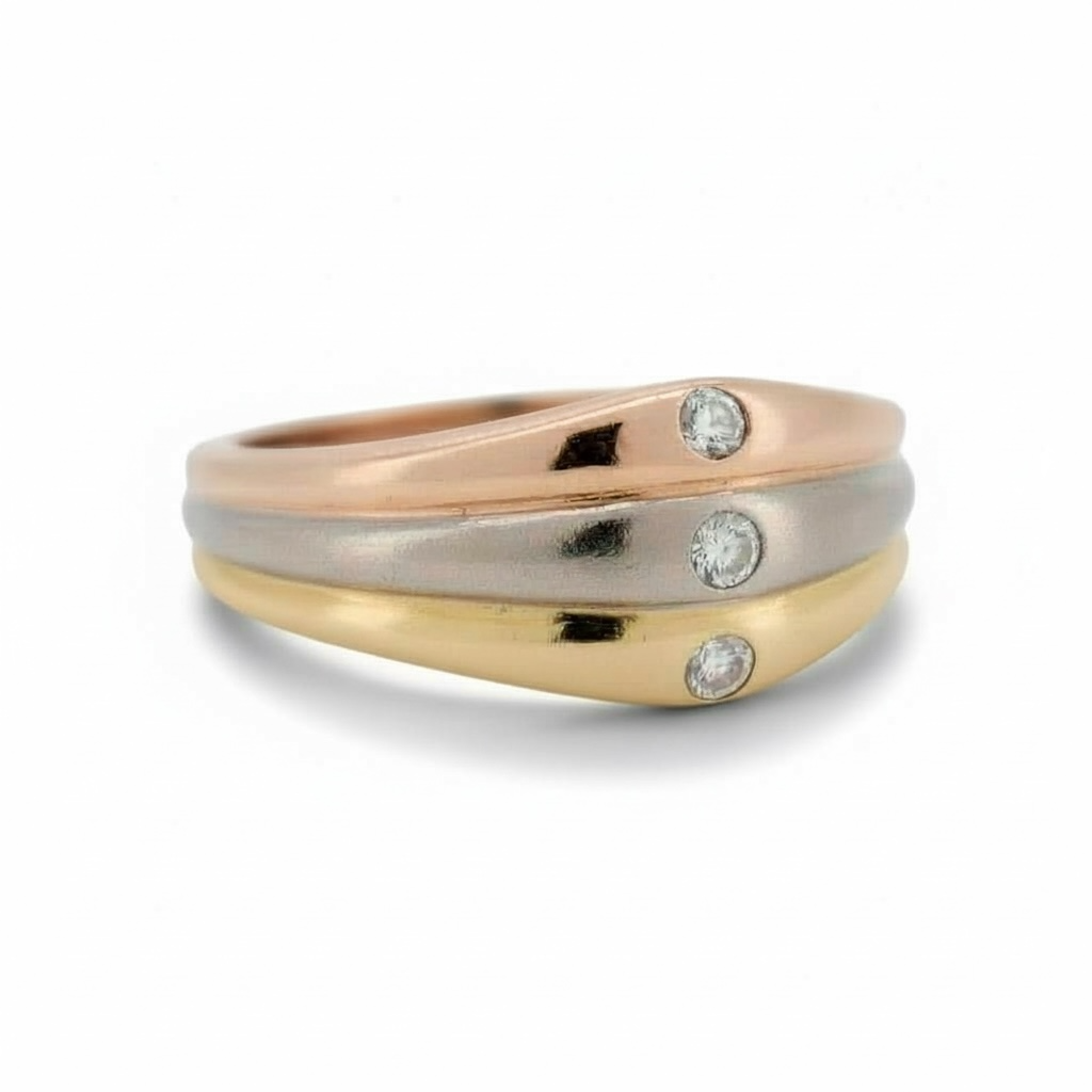 Brilliant-cut diamond in bezel setting on a Cartier luxury gold ring
