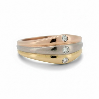 Brilliant-cut diamond in bezel setting on a Cartier luxury gold ring