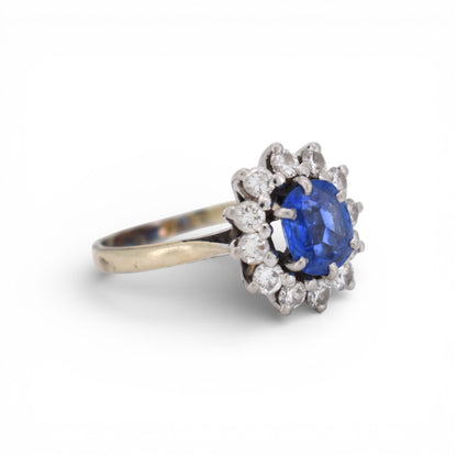Close-up of the F/G color VS clarity brilliant cut diamonds framing the vintage ring