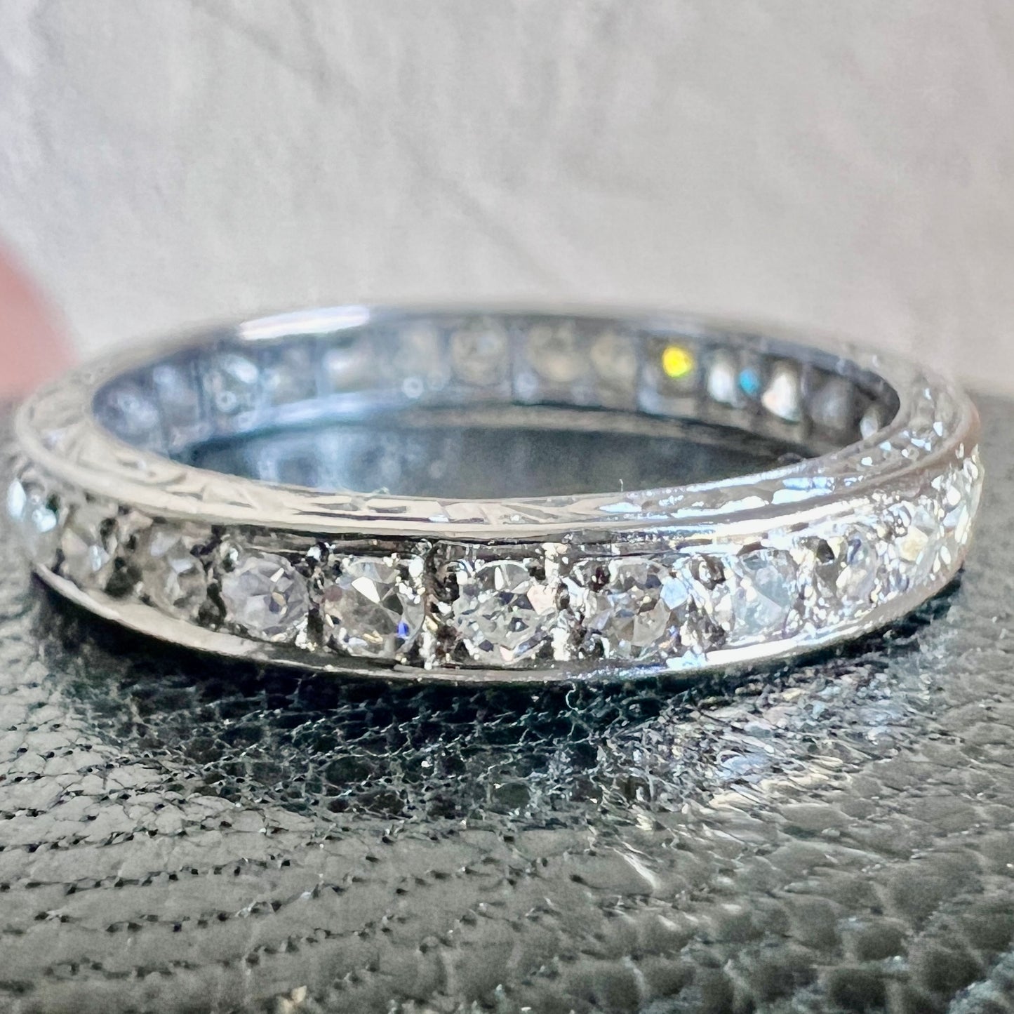 Three-quarter shot showcasing the intense fire and white brilliance of the Art Deco diamonds