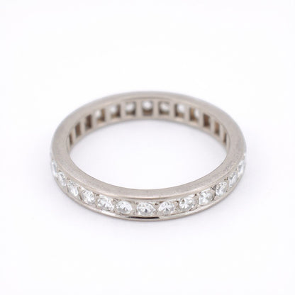 Detailed macro view of transitional cut diamonds set in an antique Art Deco eternity ring, total weight 2ct, estimated VVS clarity and E color.