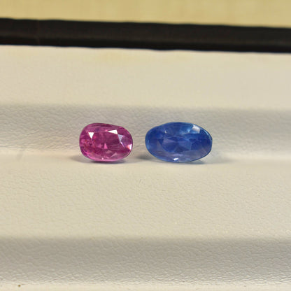 Extreme macro face shot of the 5ctw natural blue Ceylon sapphires showcasing their charming antique old mine cuts, high crowns, and deep blue brilliance.