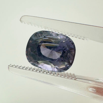 Extreme macro face shot of the 2.70ct natural lavender purple spinel showcasing its exceptional oval cushion cut and crisp facets.