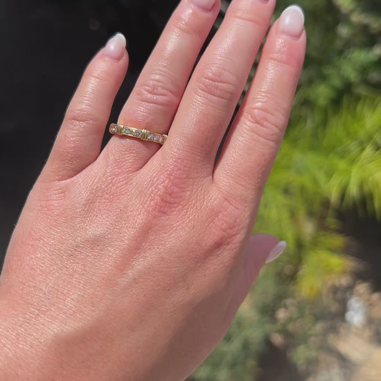 High-definition video capturing the iconic, structured lines of the 18k yellow gold Cartier Contessa ring, the intense fiery brilliance of the 0.9-carat pavé diamonds, and the authentic engraved signature and serial number on the polished gold surface in motion.