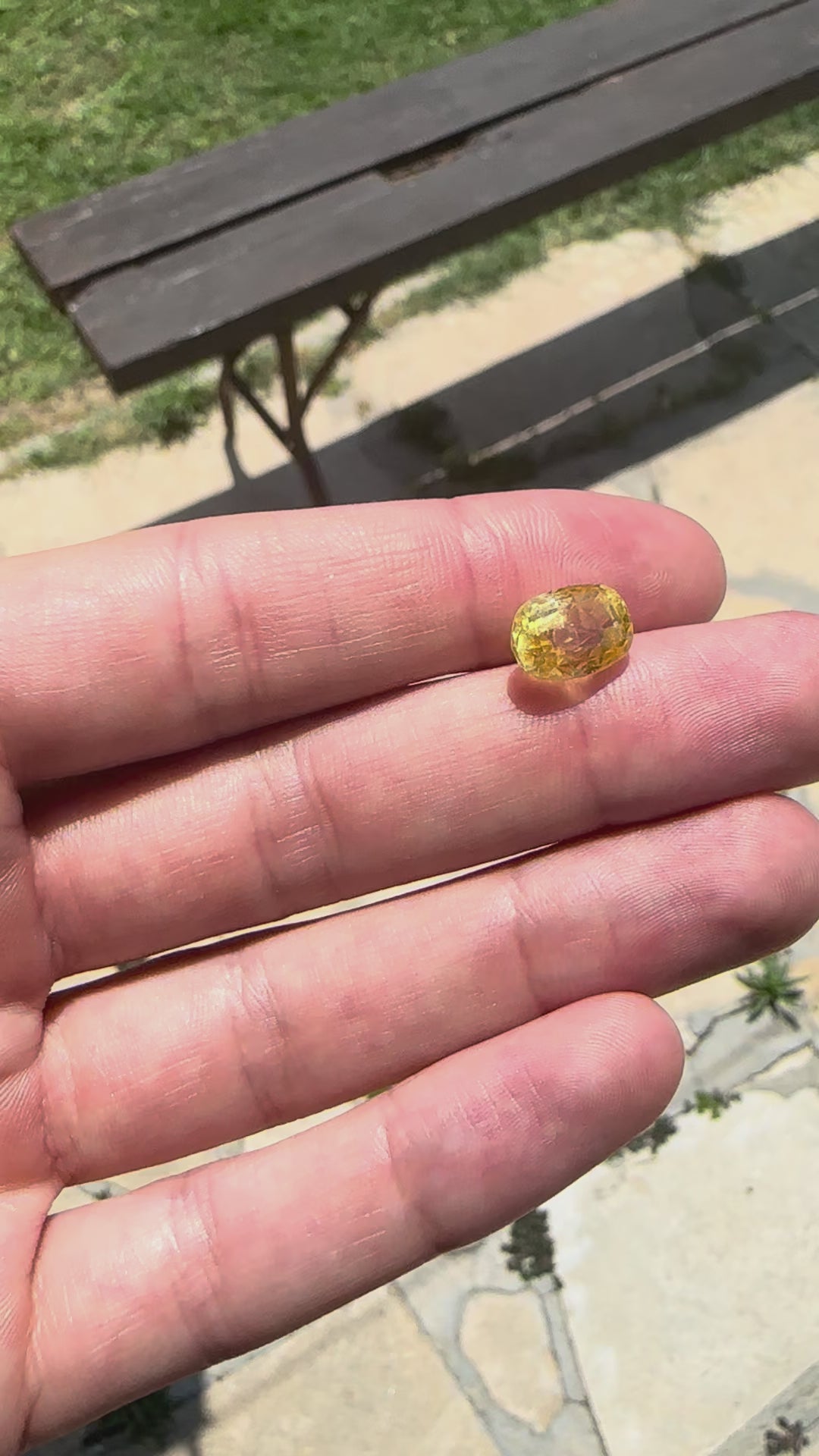 Video showing the intense brilliance, rich canary yellow flashes, and spectacular fiery sparkle of the unheated 6.10ct Ceylon sapphire in motion.