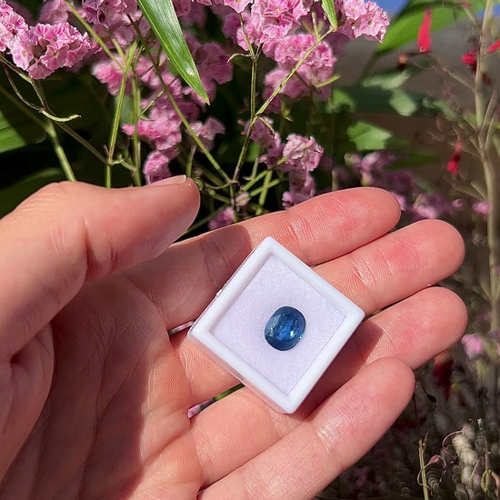 Video showing the lively brilliance, deep blue flashes, and fiery cushion-cut sparkle of the natural 3.62ct oval cushion sapphire in motion.